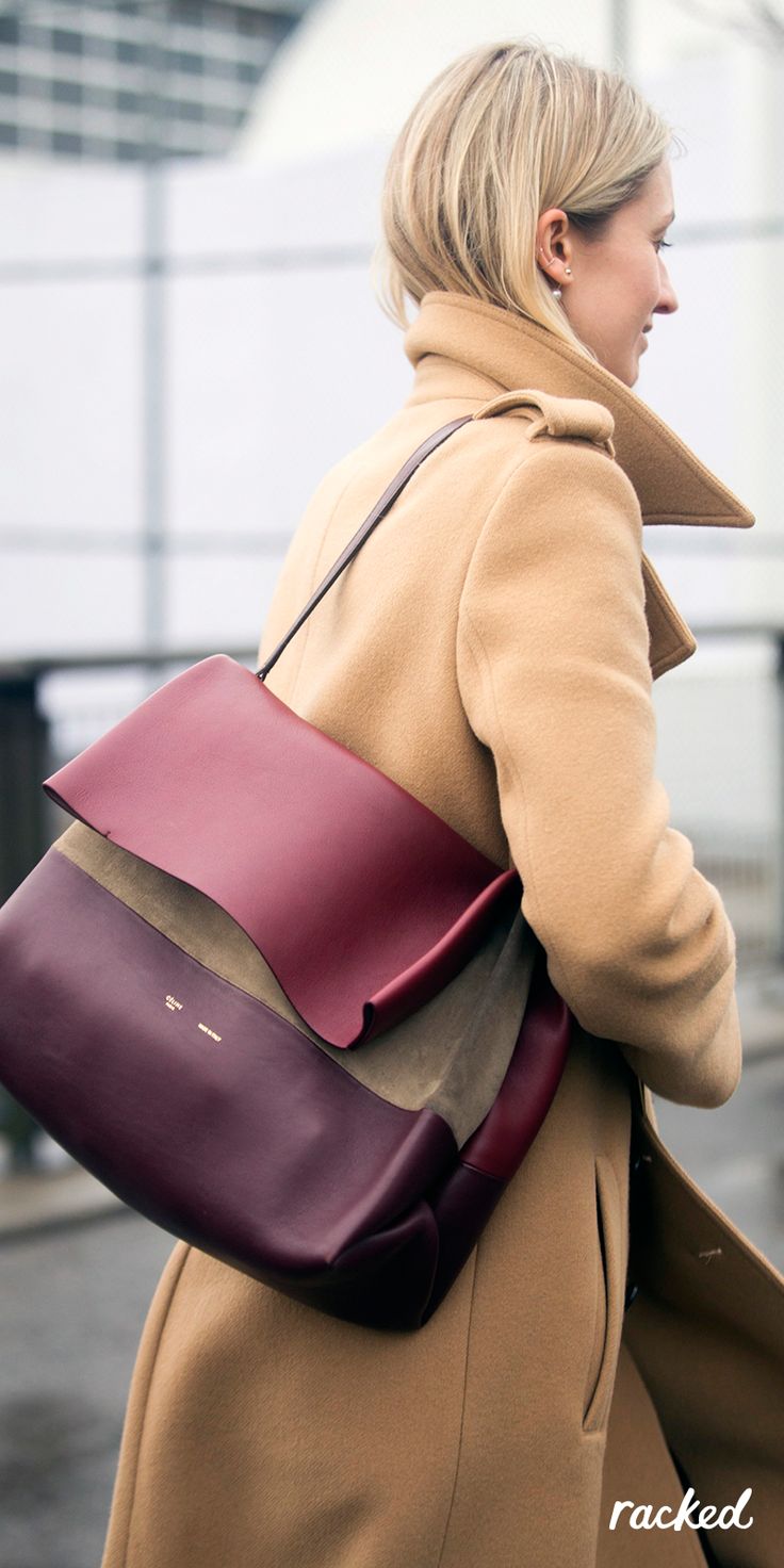 An Oxblood Céline Bag Worn With a Camel Coat at New York Fashion Week // More W...