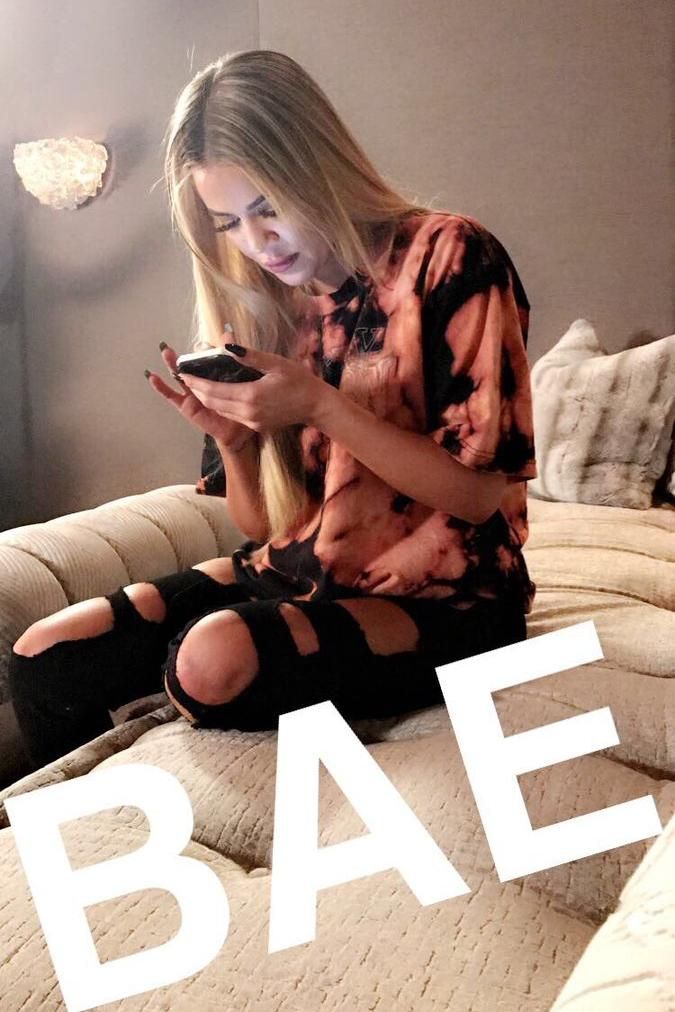 Khloe Kardashian wearing Good American Good Legs Black003 Raw Edge Hem Destroyed...