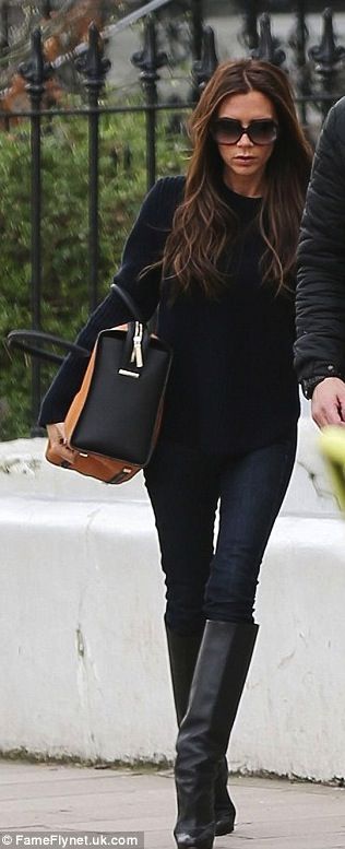 slouchy sweater  skinny jeans  big boots - say what you want about VB but she&#3...
