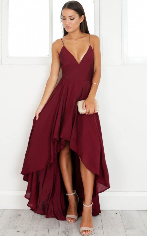 This dress is simple but gorgeous! It features a plunging neckline and thigh spl...