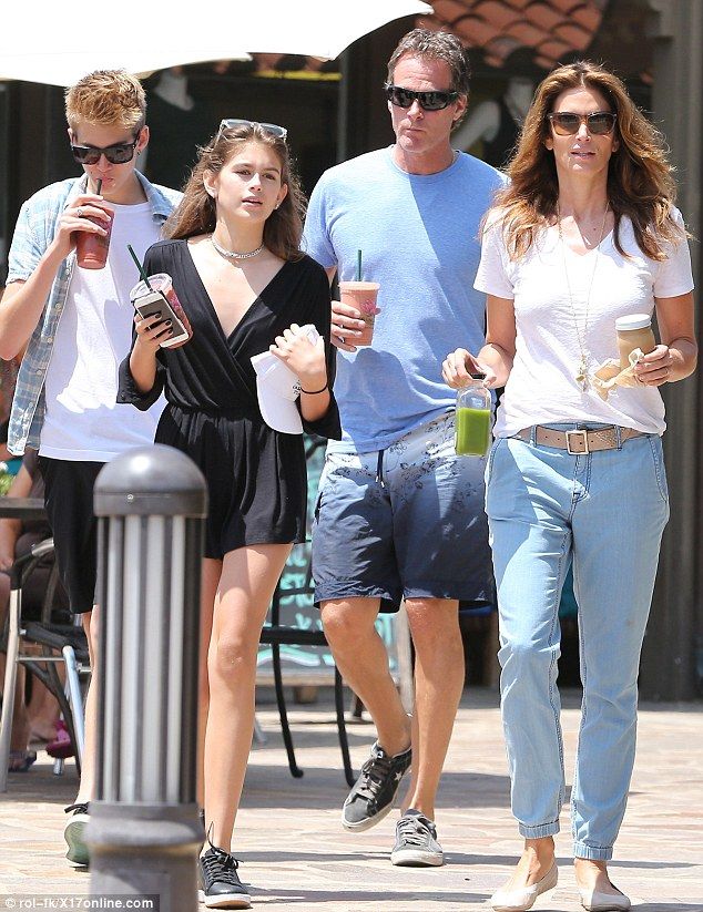 Smoothies for four: Cindy Crawford enjoyed a sunny Father's Day outing in Ma...