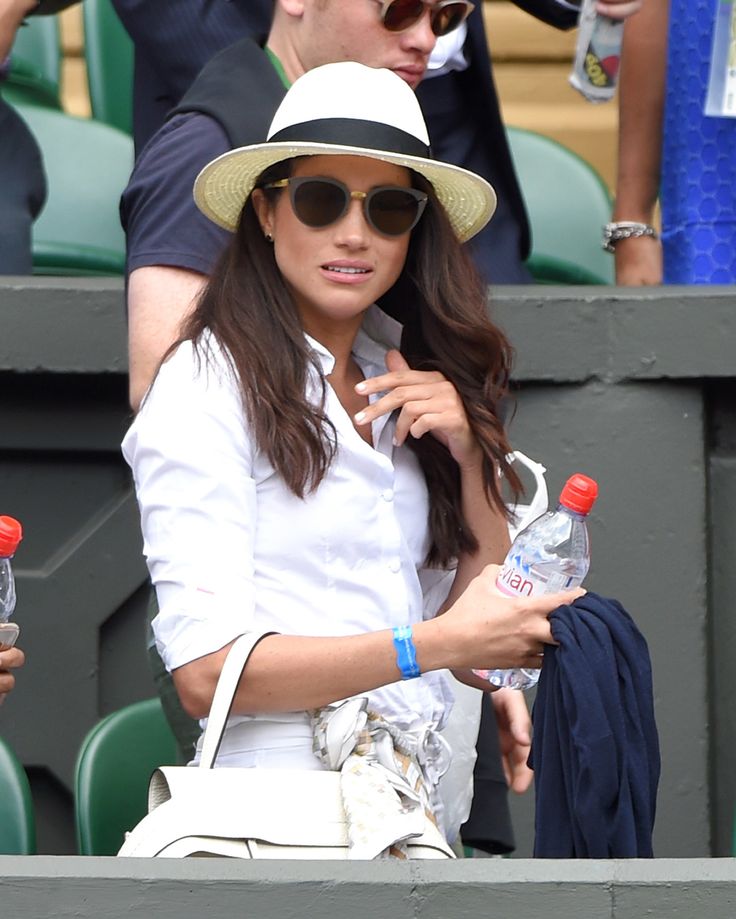 LONDON, ENGLAND - JUNE 28: Meghan Markle attends day two of the Wimbledon Tenni...