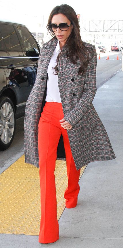 Victoria Beckham delivered another one of her posh jet-setting outfits, landing ...