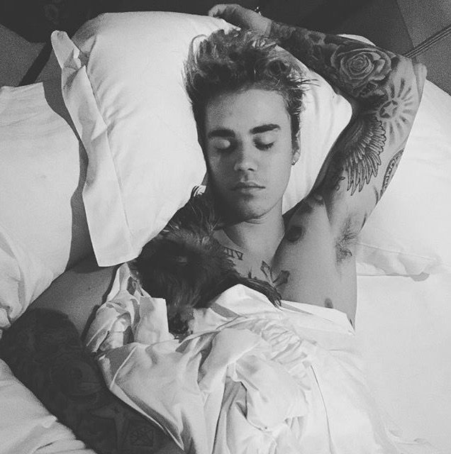 Justin and his puppy Esther cuddling in bed. Imagine just coming home to this ev...
