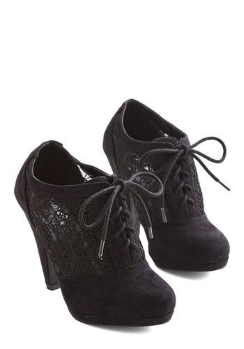 Numerous Occasions Heel in Black. With their Oxford-inspired design and crochete...
