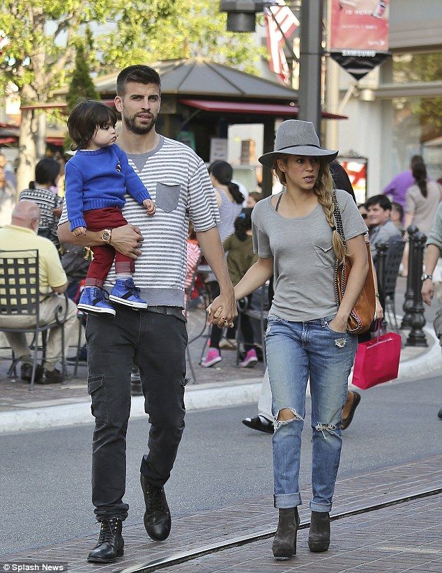 Shakira and her partner Gerard Pique take son Milan to the mall #dailymail