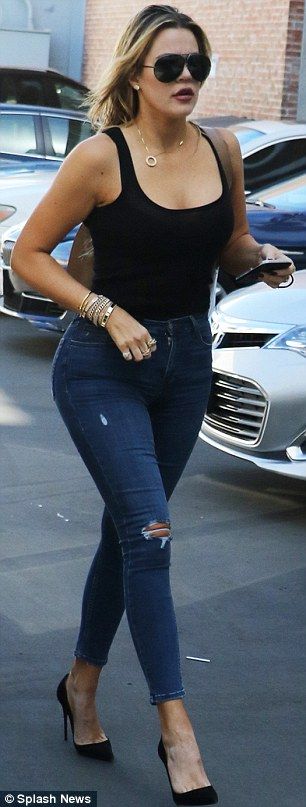 Vested interest: The saucy socialite was drawing plenty of stares in this admira...