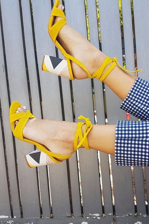 Walking on sunshine. Bright yellow heels = happiness.