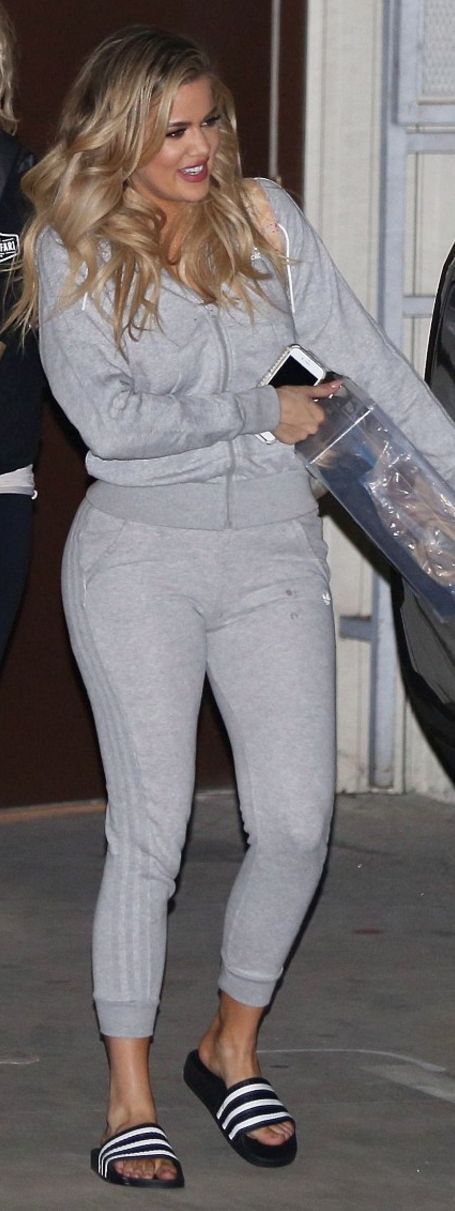 Who made  Khloe Kardashian's gray sweatpants, sweatshirt, and black sandals?