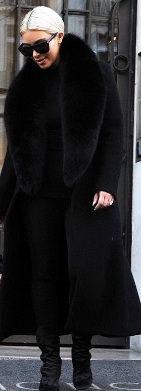 Who made  Kim Kardashian's black sunglasses, velvet boots, and coat?