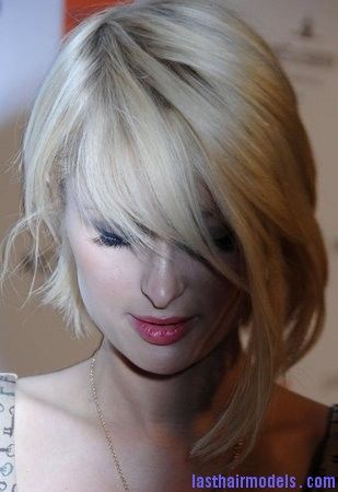 asymmetrical bob. I'm considering this when my bangs grow out! But a bit lon...